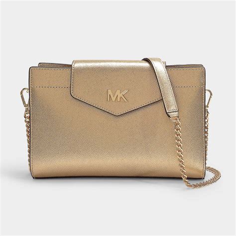 gold bag michael kors|michael kors gold crossbody bag.